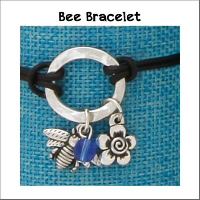 Bee bracelet with charms and leather